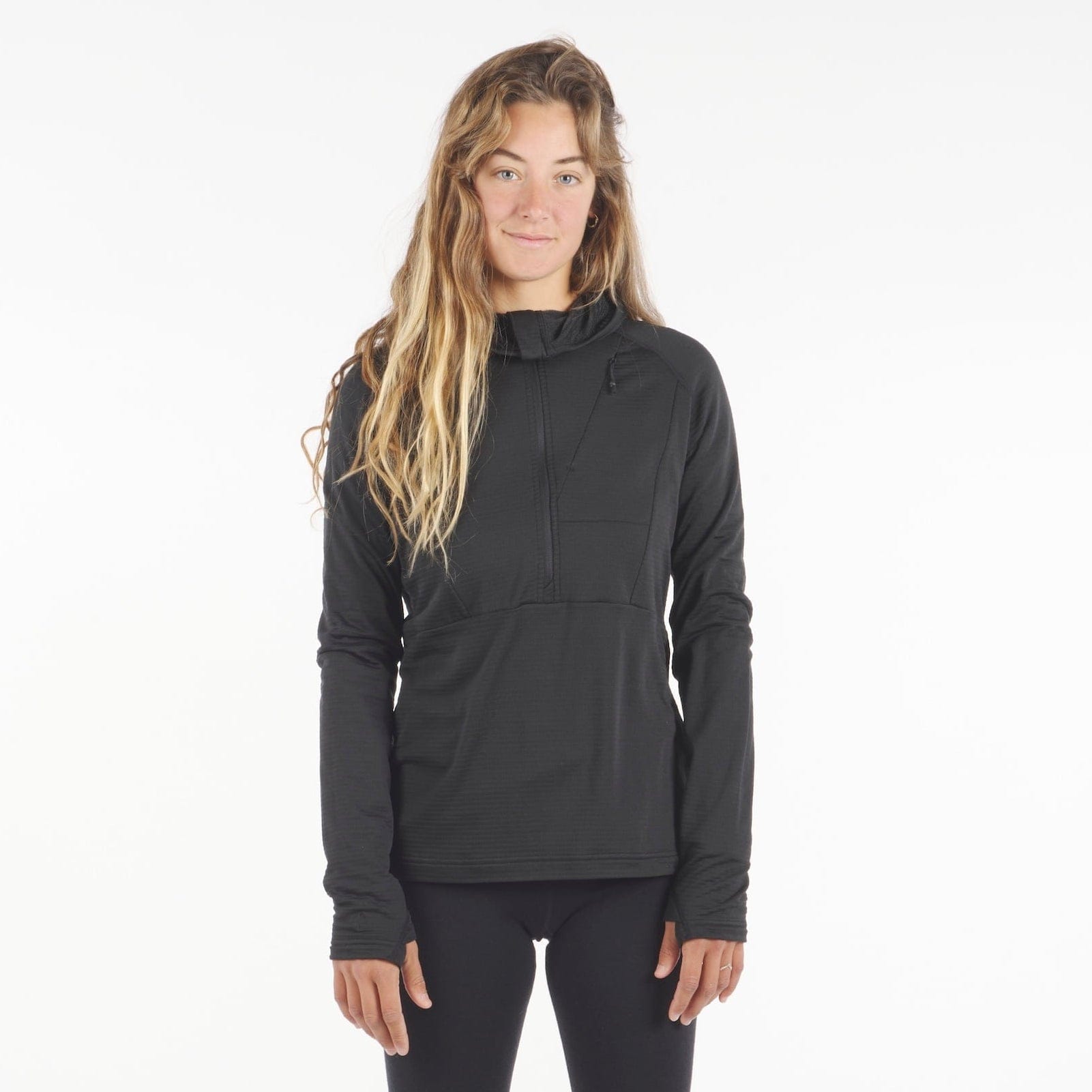 a woman wearing a Convict Canyon Hoodie in black