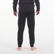 man in black Ridge Merino 100% Merino Hyde Joggers and an Aspect Long Sleeve Shirt