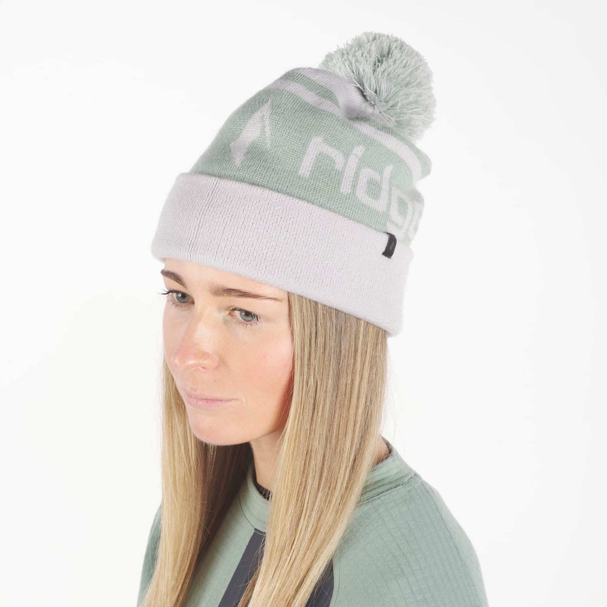 woman wearing a Ridge Team Beanie and Cloudripper Crew Pullover