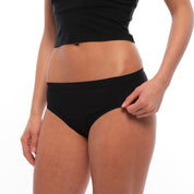 woman wearing black Merino Hipster Briefs with a matching bralette