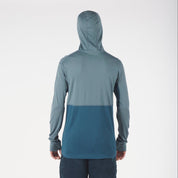 back view of a man wearing a Pursuit Air Hoodie in blue