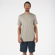 a man wearing a Rock Ridge Pursuit Merino Ultralight T-shirt