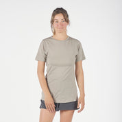 a runner wearing a Pursuit T-Shirt in Rock Ridge with running shorts