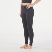 a woman wearing black Northwind Merino Wool Leggings