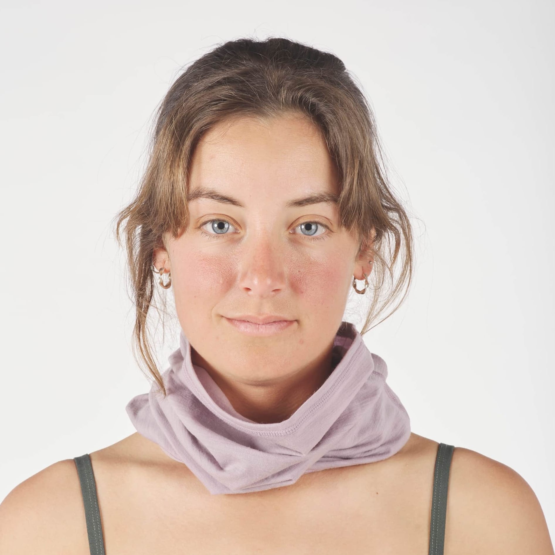 a woman wearing a Sierra Merino Wool Neck Tube in Dusty Lilac with a bralette