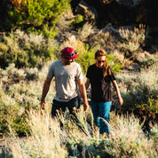 a man hiking in a Journey Merino Wool Pocket Tee