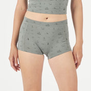 a woman wearing Ridge Merino Wool Boy Shorts in the Backpacker Print