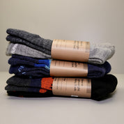 a three-pack of different colored Minaret Socks - black, gray and navy