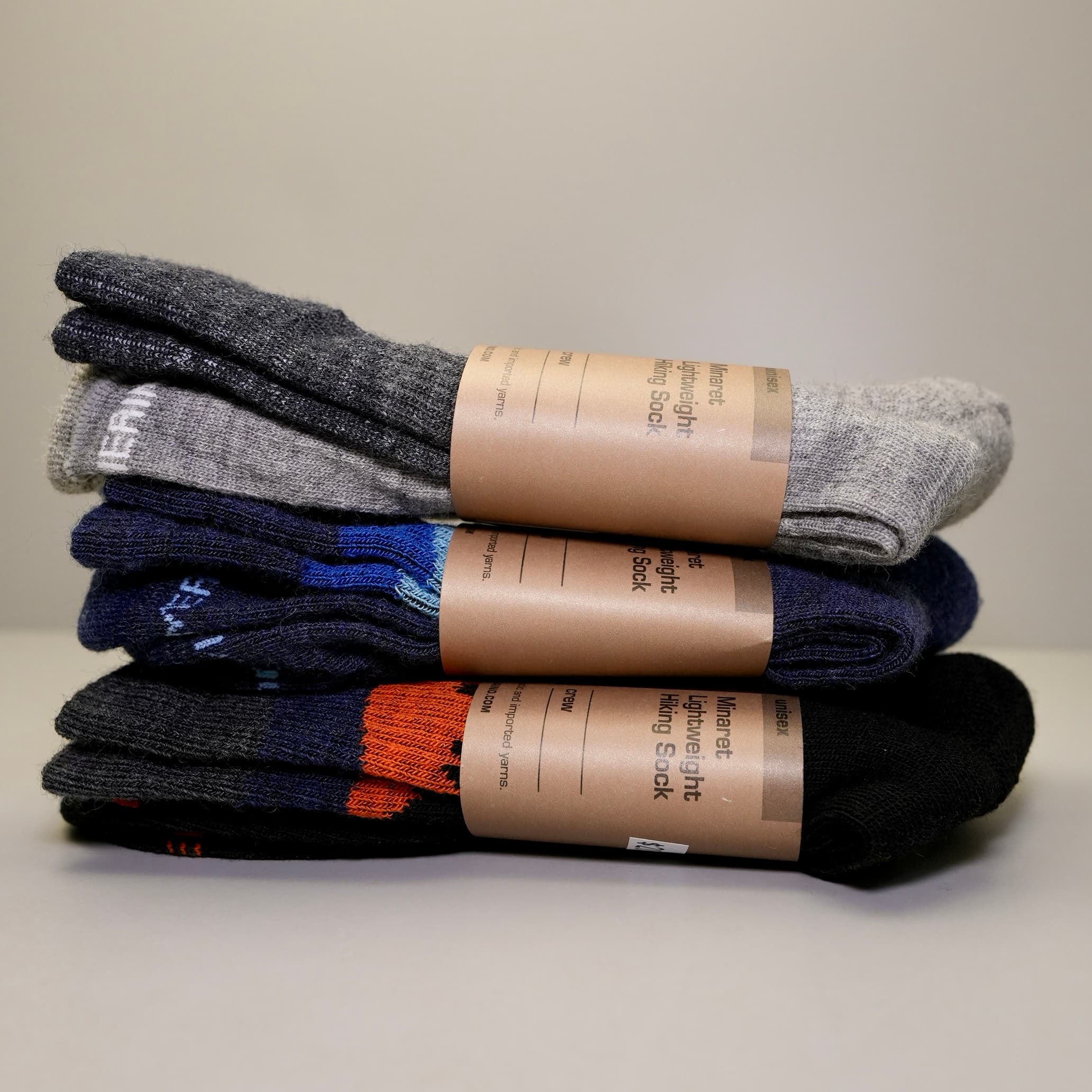 a three-pack of different colored Minaret Socks - black, gray and navy