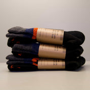 a three-pack of Minaret Socks in Black
