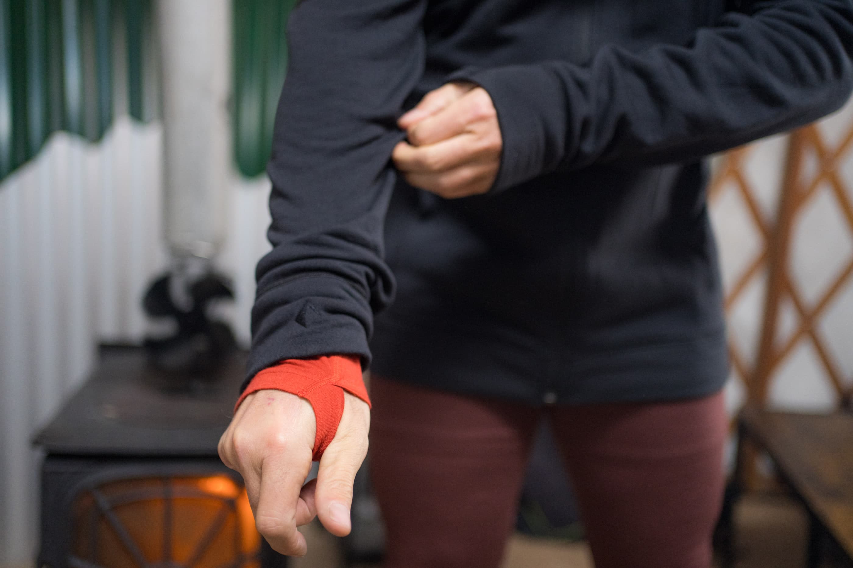 a skier layers up with Ridge base layers and a Baldwin Jacket