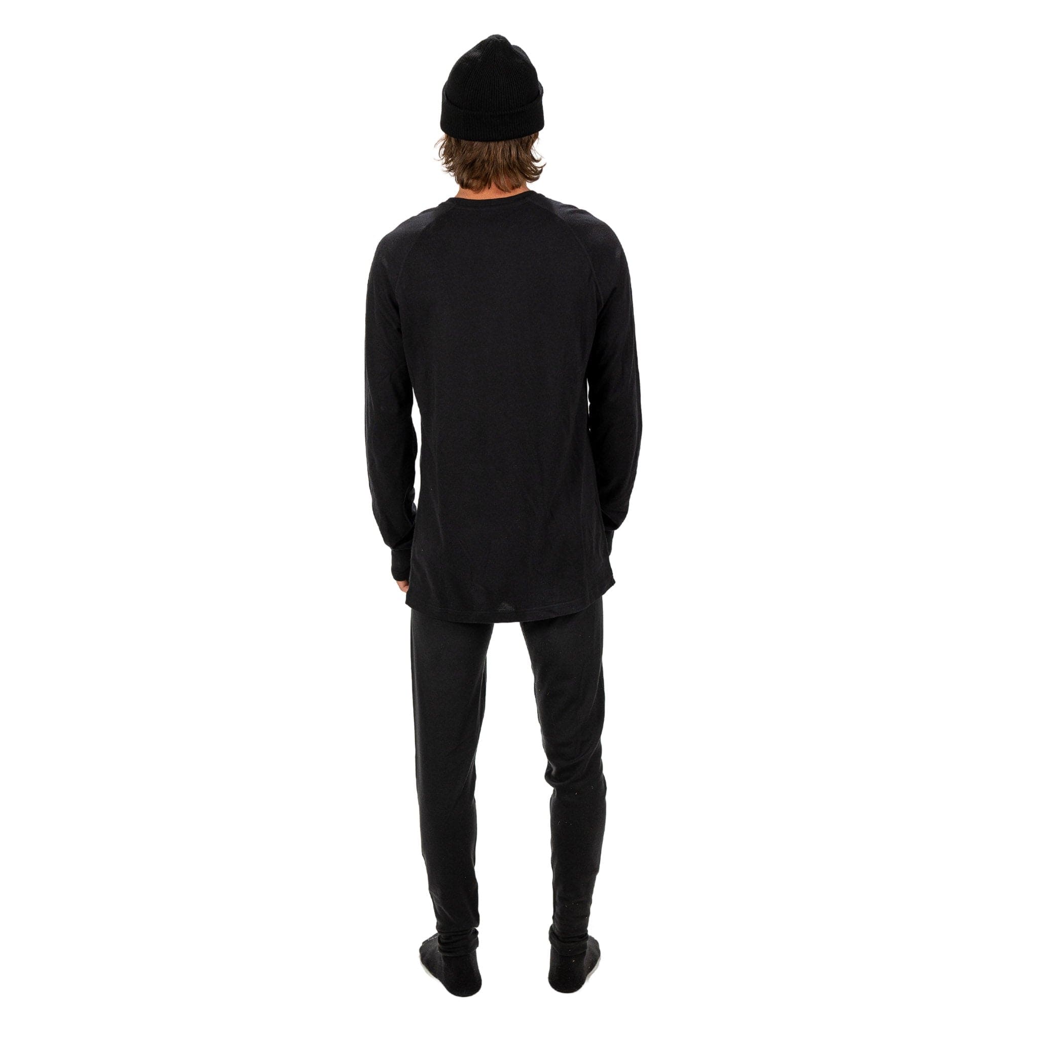 a man wearing Aspect base layers in black from the back