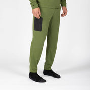 a man wearing green Cloudripper Grid Fleece Joggers
