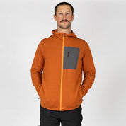 a man wearing a Cloudripper Full Zip Hoodie in Cinnamon