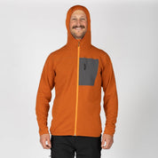 a man wearing a Cloudripper Full Zip Hoodie in Cinnamon with the hood up