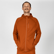 a man wearing a Cinnamon Hyde Hoodie with matching joggers