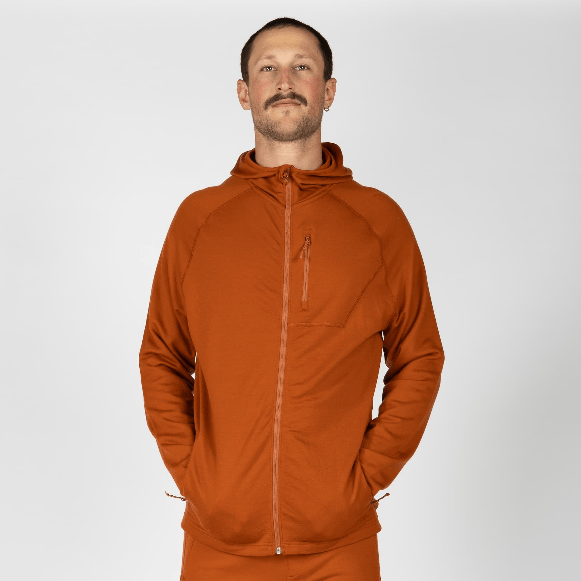 a man wearing a Cinnamon Hyde Hoodie with matching joggers