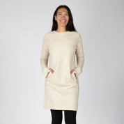 a woman wearing a Sand Hyde 100% Merino Wool Sweater Dress