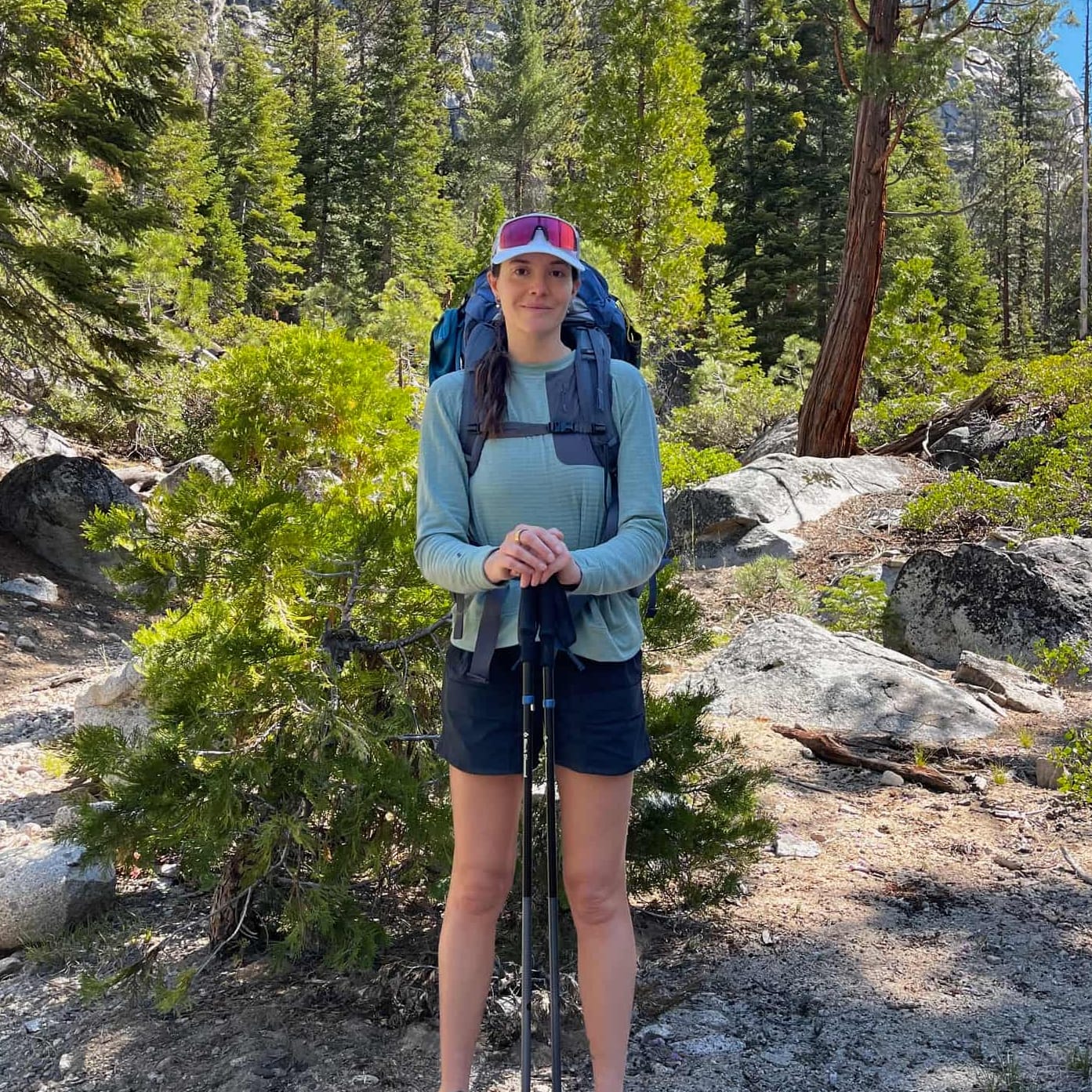a backpacker wearing a Cloudripper Grid Fleece Pullover