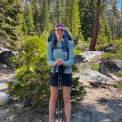 a backpacker wearing a Cloudripper Grid Fleece Pullover