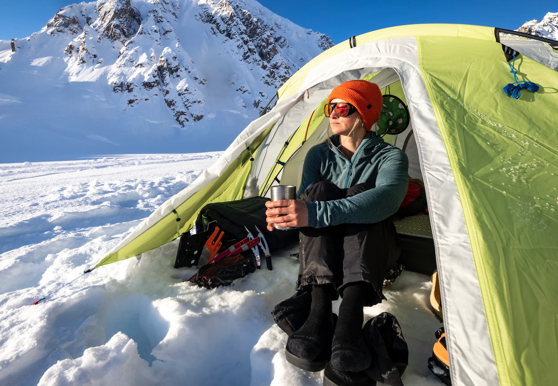 McKenna Peterson snow camping in Ridge Merino layers including a Convict Canyon Hoodie
