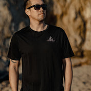 a man wearing an Eastside Natural Tee