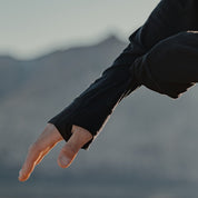 a detail shot of the thumb holes on the Pursuit Pro Merino Hoodie