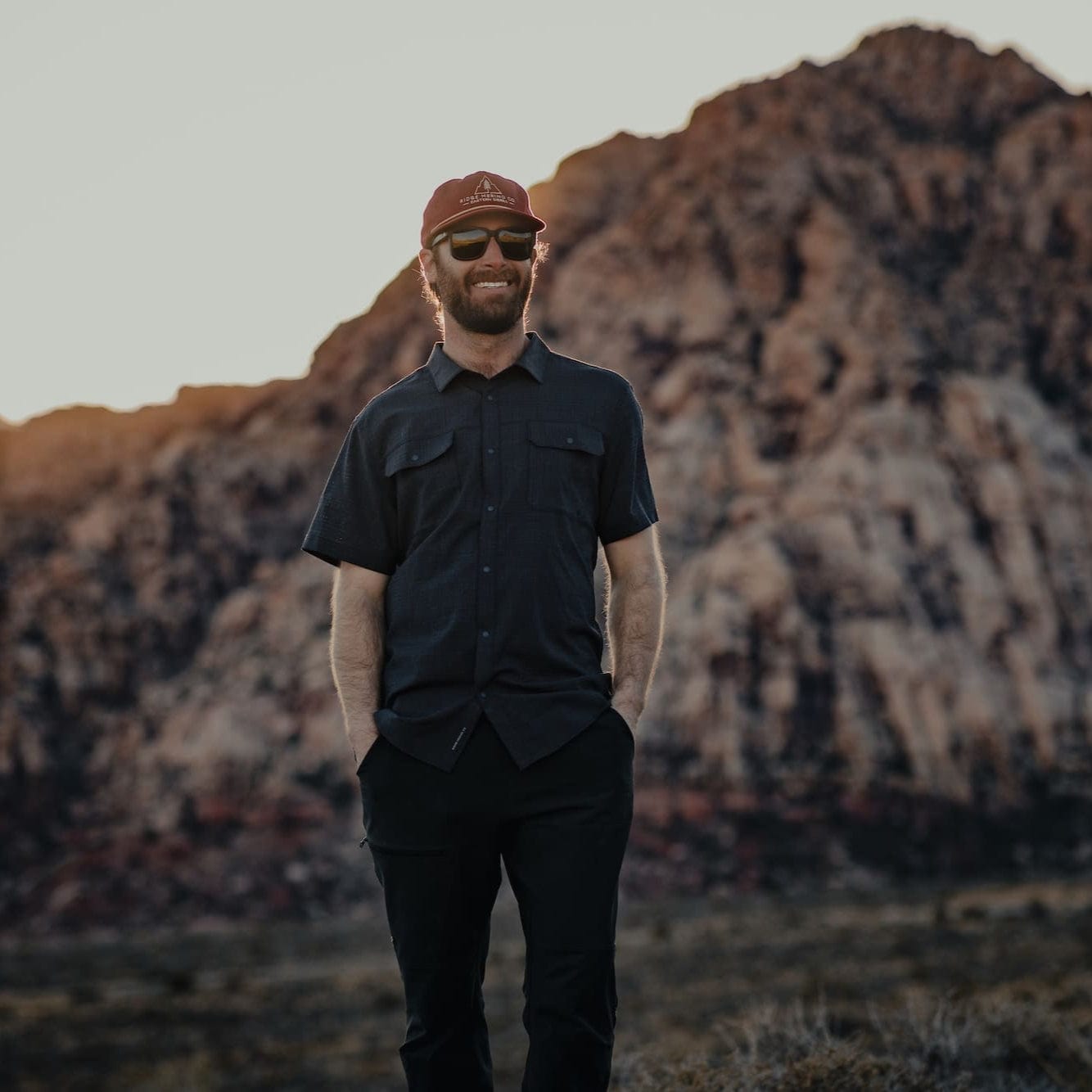 a man wearing the High Country Button Down Short Sleeve