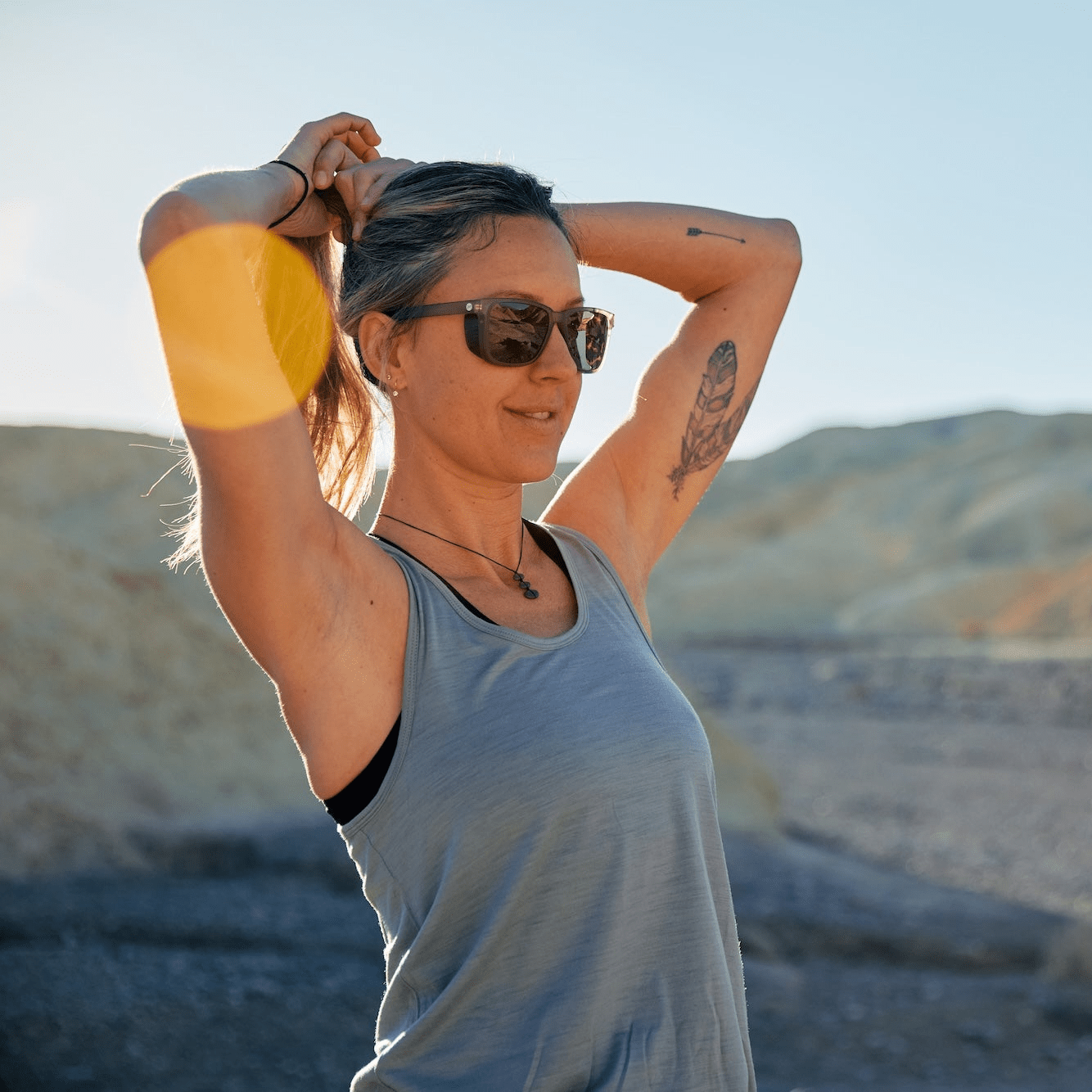 A woman wearing a Frankie Tank