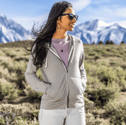 a woman wearing a Rock Ridge Traveler Hoodie over a Canopy T-Shirt in the mountains near Mammoth Lakes CA