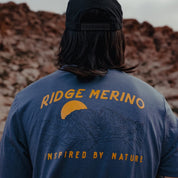 a man wearing a Ridge Merino graphic Journey Pocket Tee