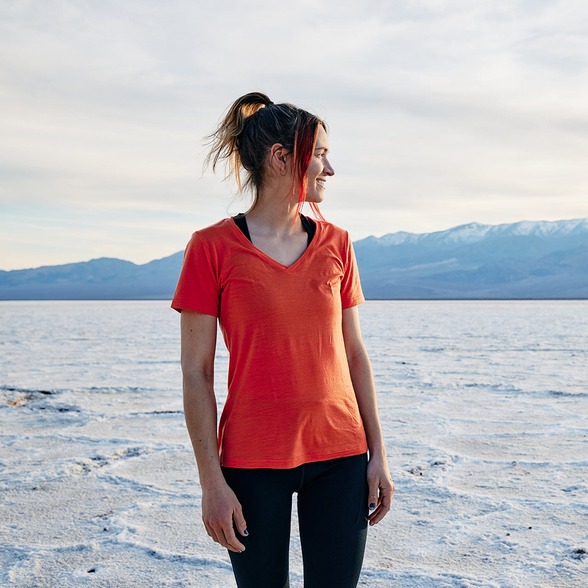 a woman wearing a Wander V-Neck T-Shirt in Death Valley